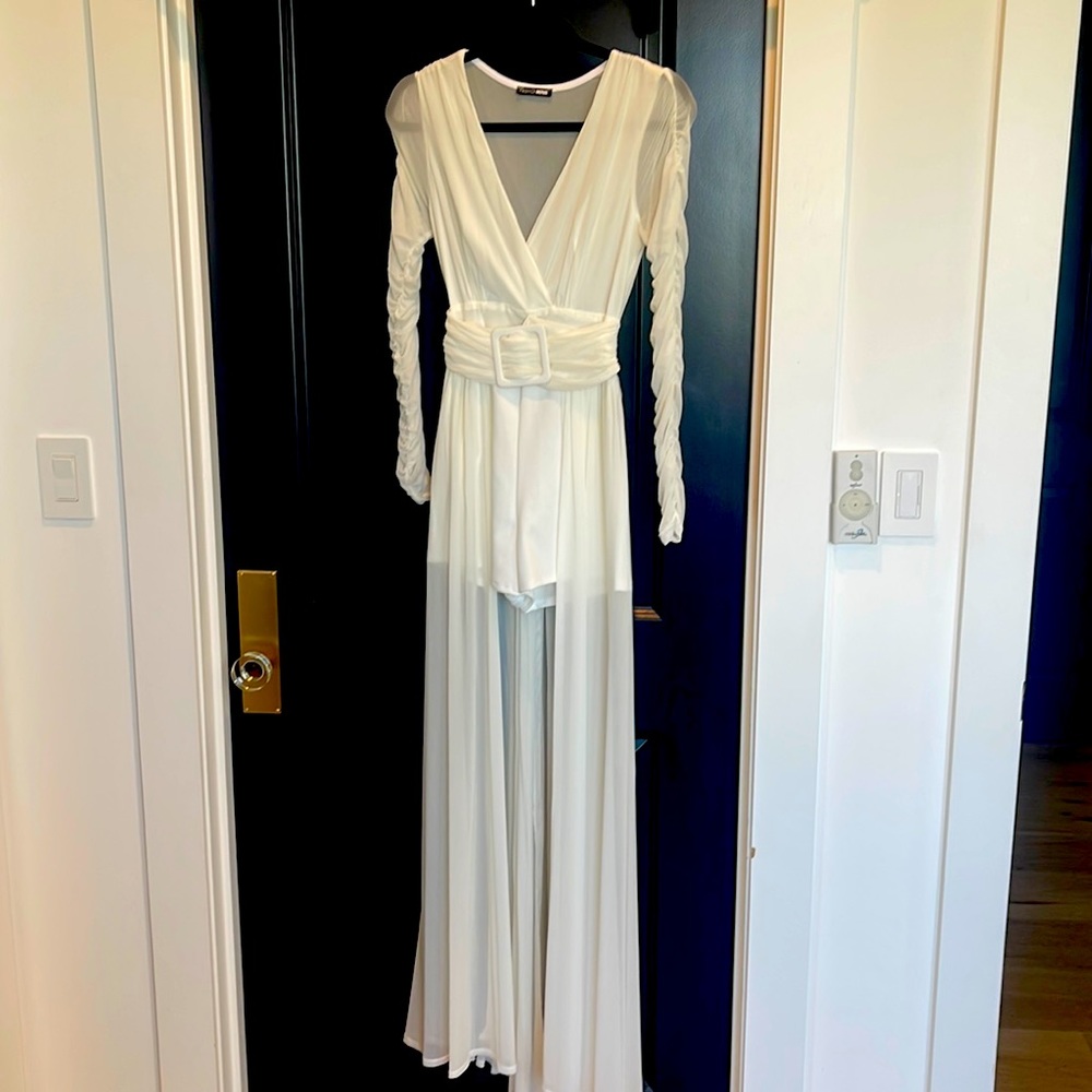 Sexy white romper high low. Worn 1x for a photo shoot. Very comfortable and sexy